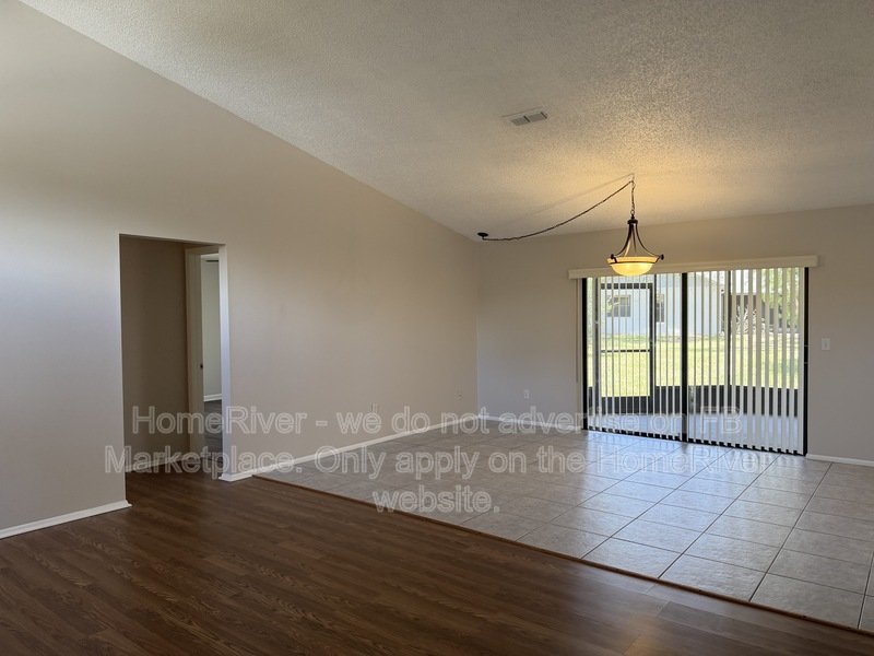 Screened Patio | Large Yard | Attached Garage | Vinyl Flooring property image