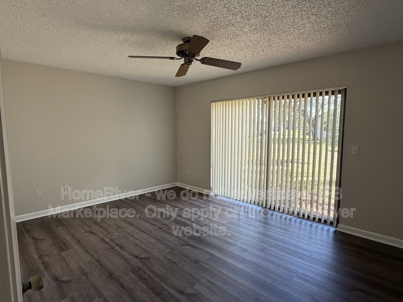 Screened Patio | Large Yard | Attached Garage | Vinyl Flooring property image