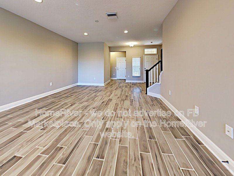 Gated Wiregrass Ranch Townhome | Pond View | Water Included property image