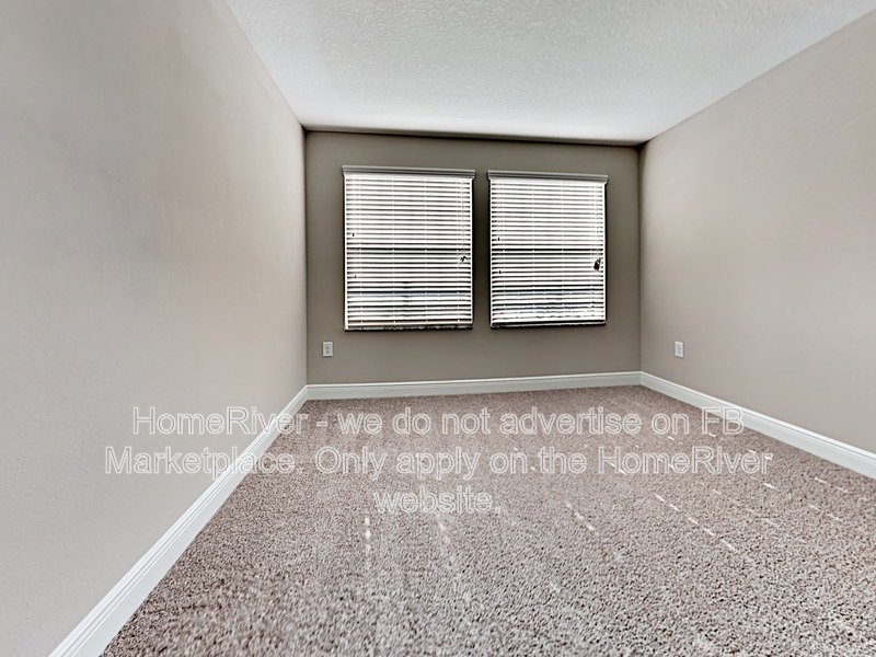 Gated Wiregrass Ranch Townhome | Pond View | Water Included property image