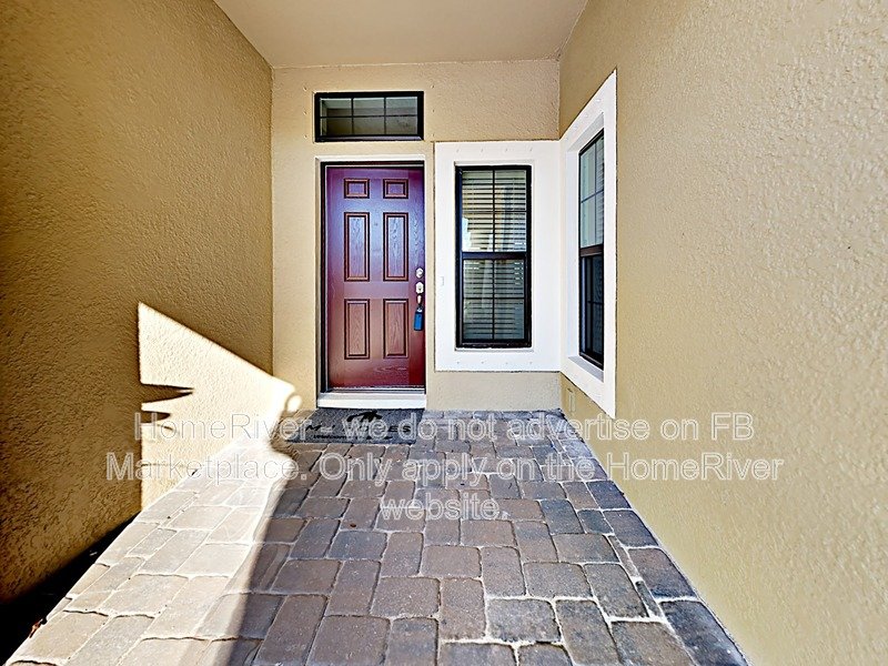Gated Wiregrass Ranch Townhome | Pond View | Water Included property image