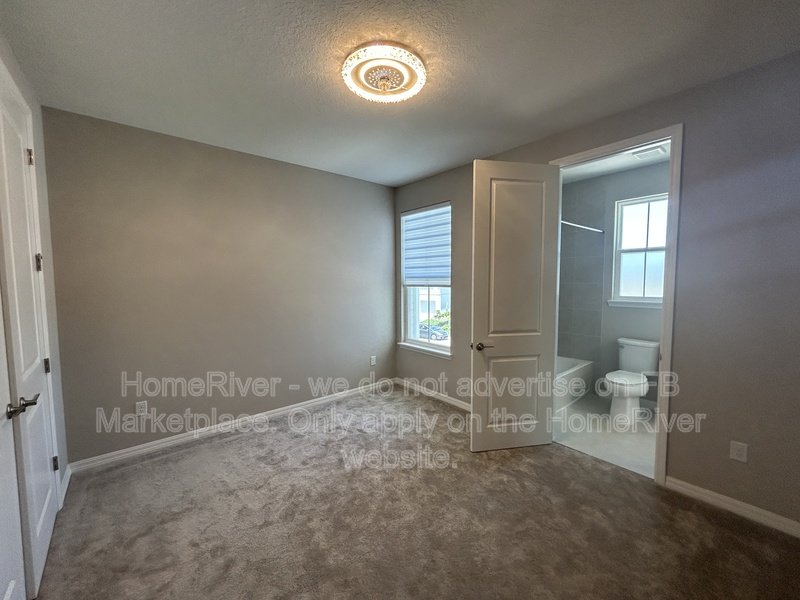 Brand-New Luxury Townhome | Lagoon Views | Internet/ Cable Included! property image