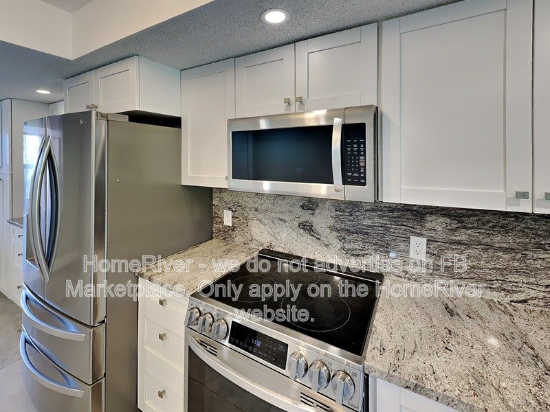 Move In Ready! - 6505 STONE RIVER RD APT 104, BRADENTON FL 34203 property image