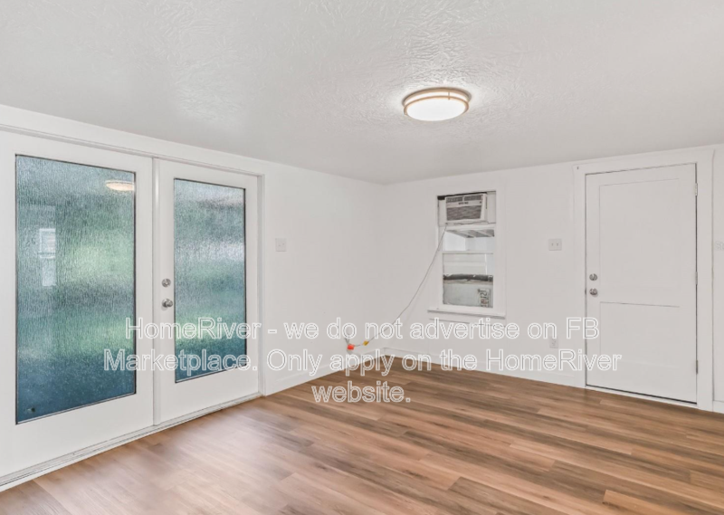 1 bedroom home with large fenced yard and carport property image