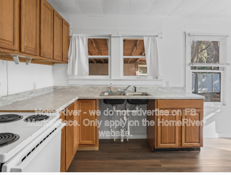 1 bedroom home with large fenced yard and carport property image