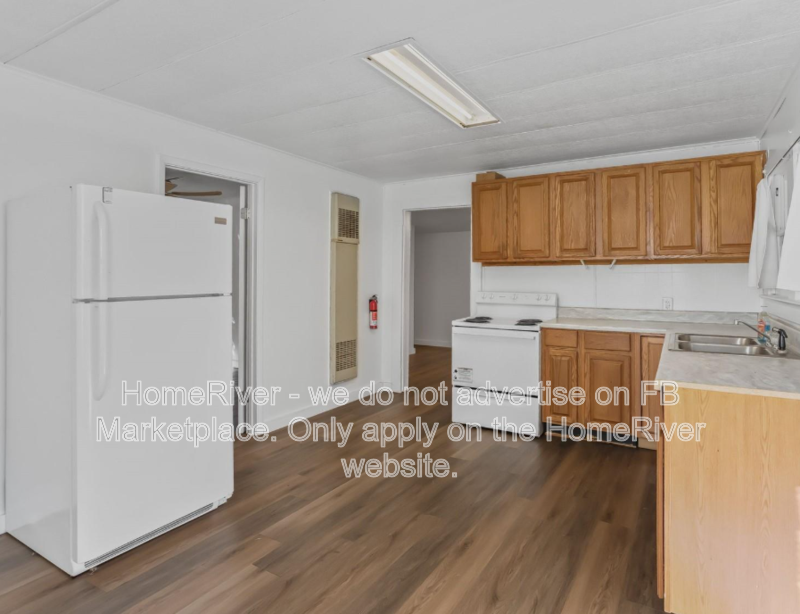 1 bedroom home with large fenced yard and carport property image