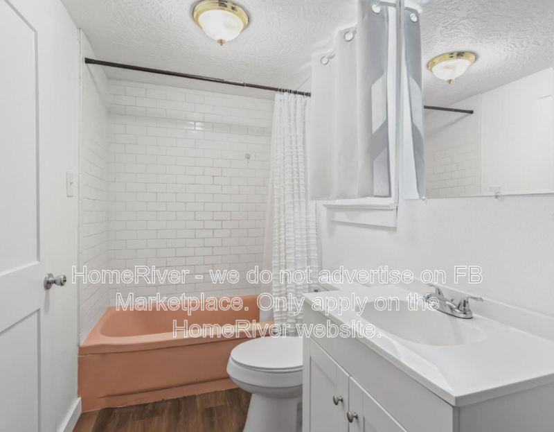 1 bedroom home with large fenced yard and carport property image