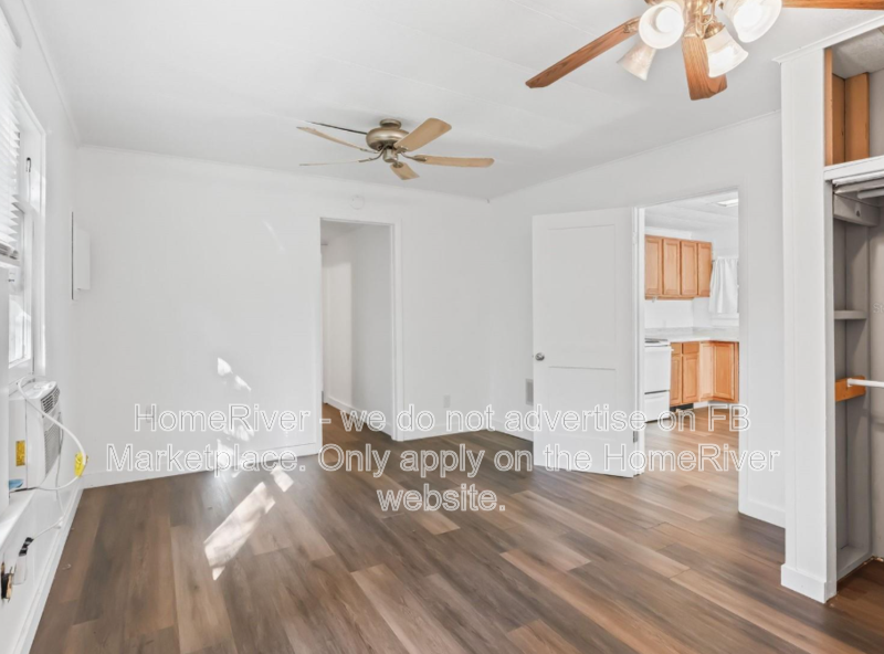 1 bedroom home with large fenced yard and carport property image