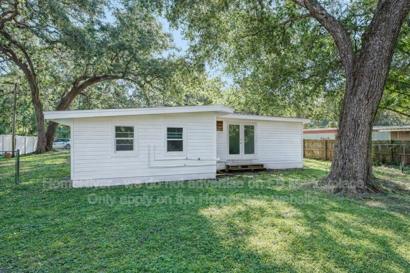 1 bedroom home with large fenced yard and carport property image