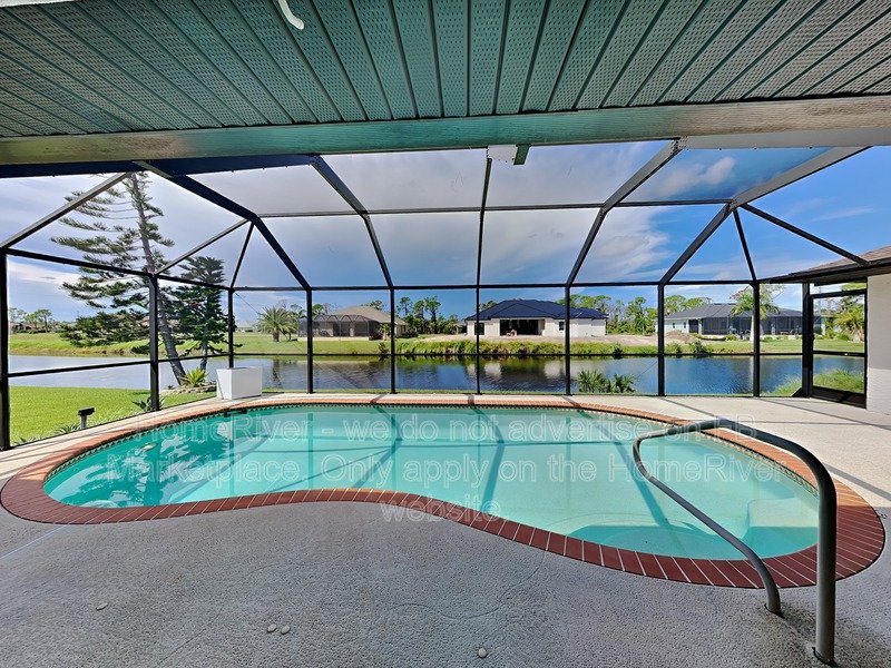 Poolside Paradise w/ Canal Views | 3BR + Screened Lanai property image