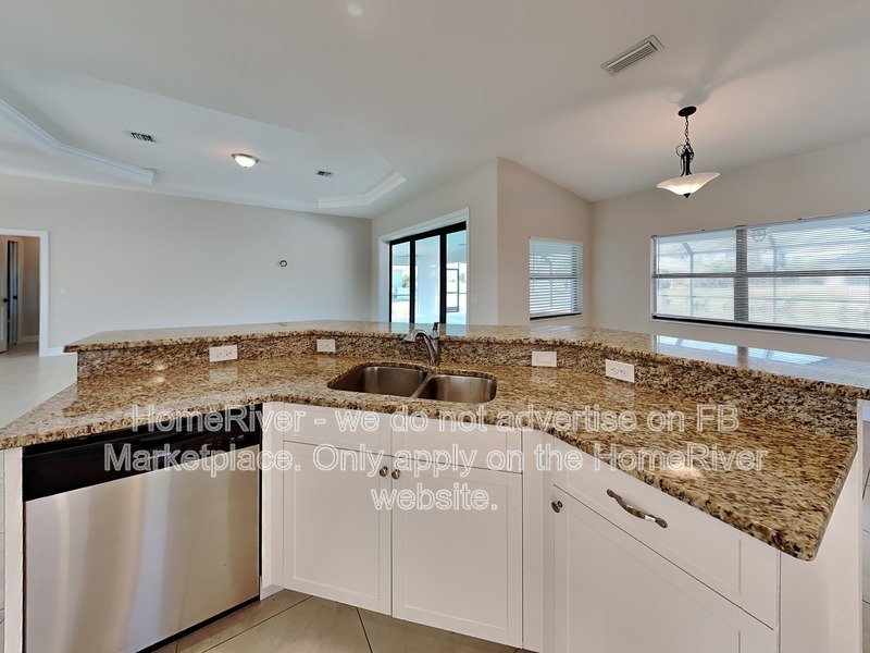 Poolside Paradise w/ Canal Views | 3BR + Screened Lanai property image