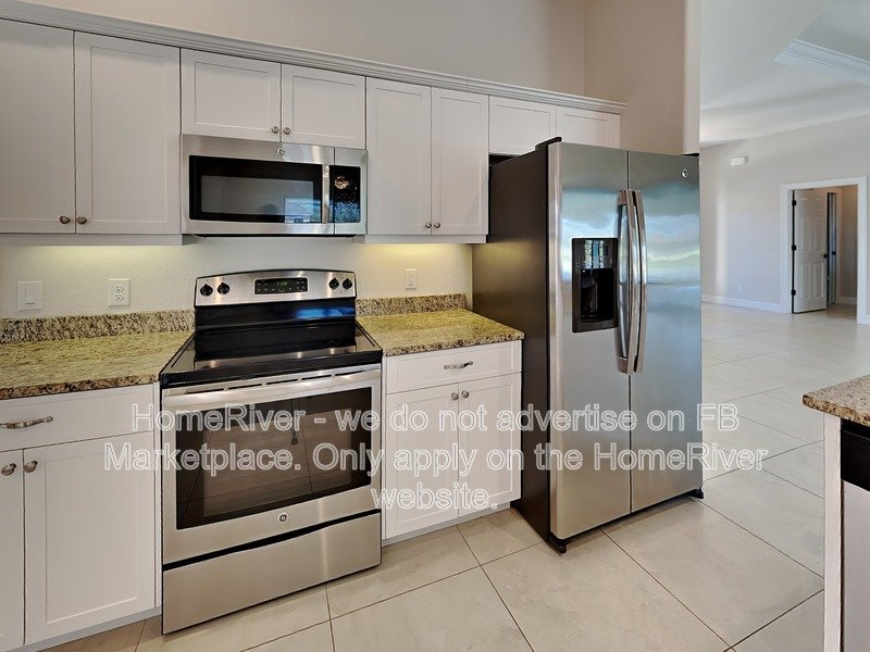 Poolside Paradise w/ Canal Views | 3BR + Screened Lanai property image