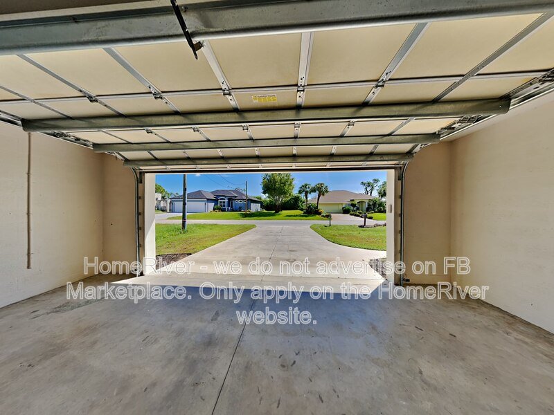 Poolside Paradise w/ Canal Views | 3BR + Screened Lanai property image