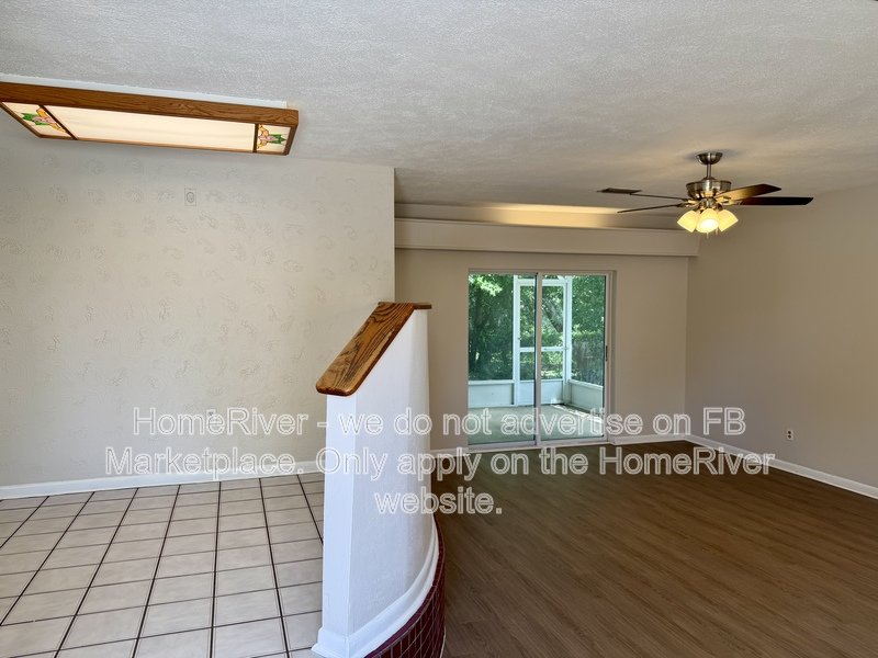 4 bedroom home with fenced yard and screened porch property image