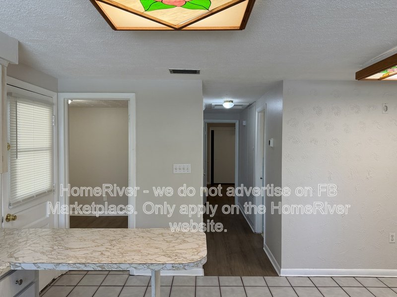 4 bedroom home with fenced yard and screened porch property image