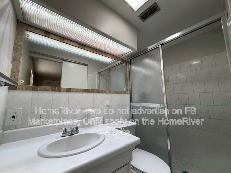 4 bedroom home with fenced yard and screened porch property image