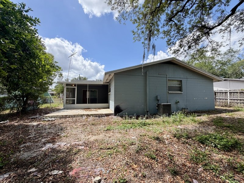 4 bedroom home with fenced yard and screened porch property image